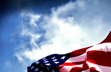 American flag and blue sky