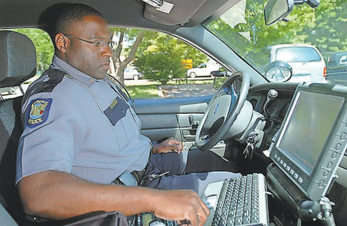 Police officer in patrol car