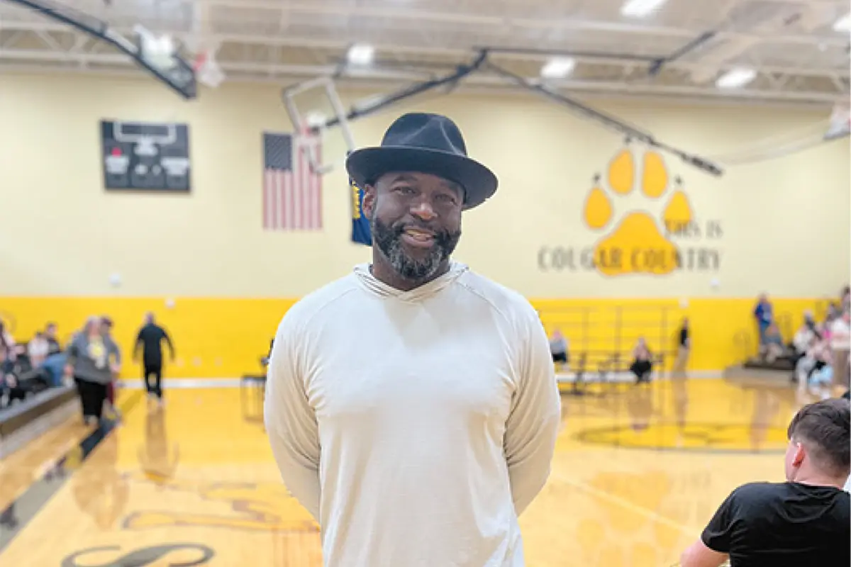 Man standing on basketball court